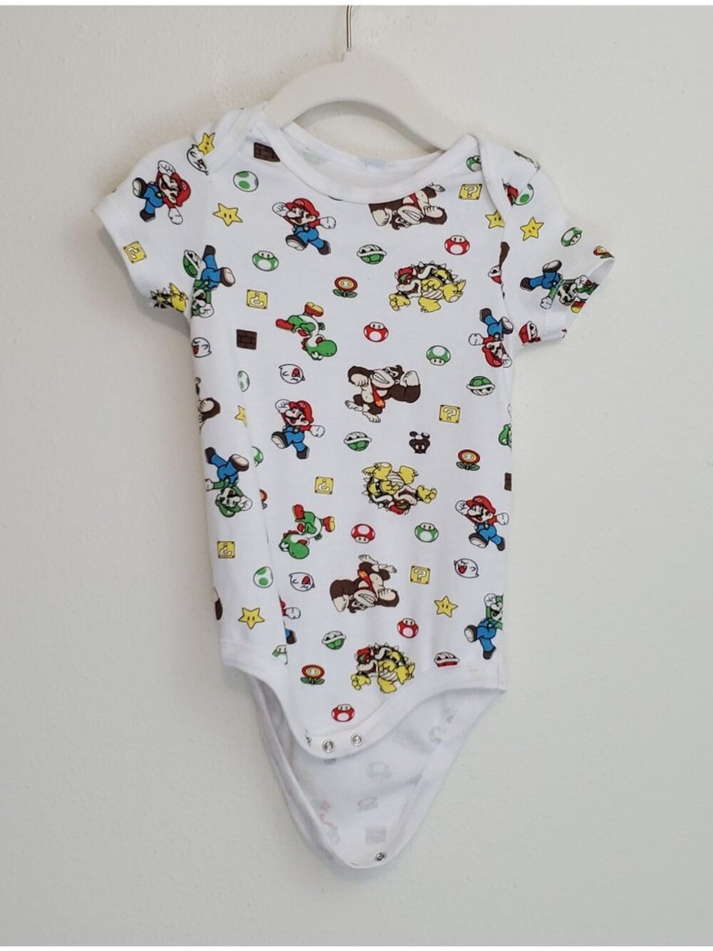 Super Mario Nintendo all-over-print baby onesie